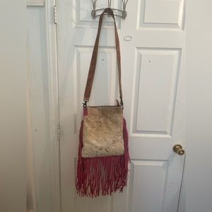 Cowhide with fringe purse
